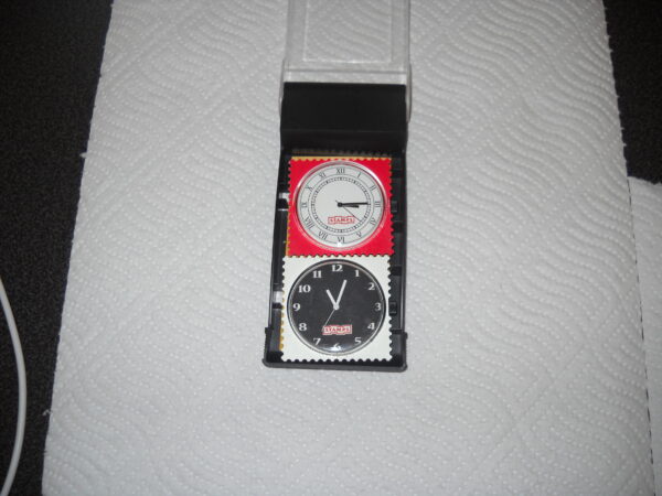 Zwei S.T.A.M.P.S. eine Marke Uhren im Briefmarken-Design Neu mit OVP